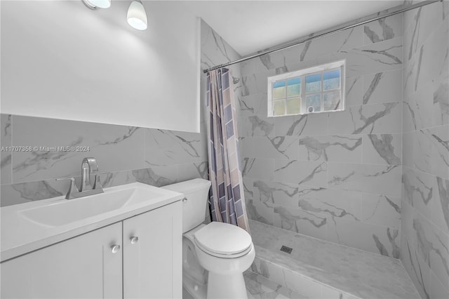 bathroom featuring vanity, toilet, tile walls, and curtained shower