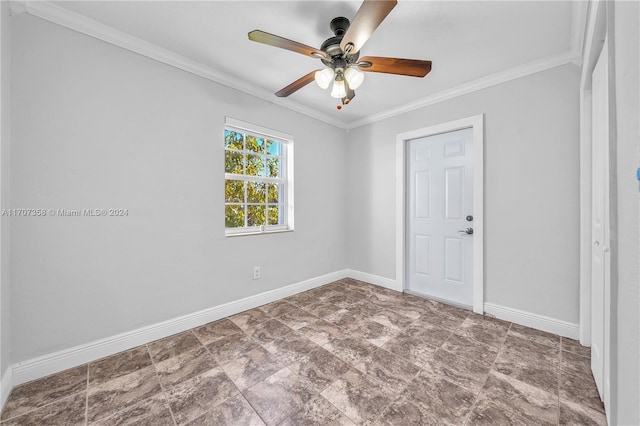 spare room featuring ceiling fan and ornamental molding