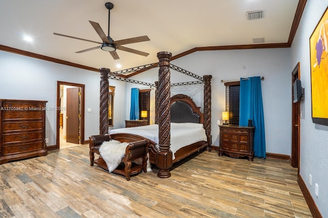 bedroom featuring crown molding, hardwood / wood-style floors, and ceiling fan