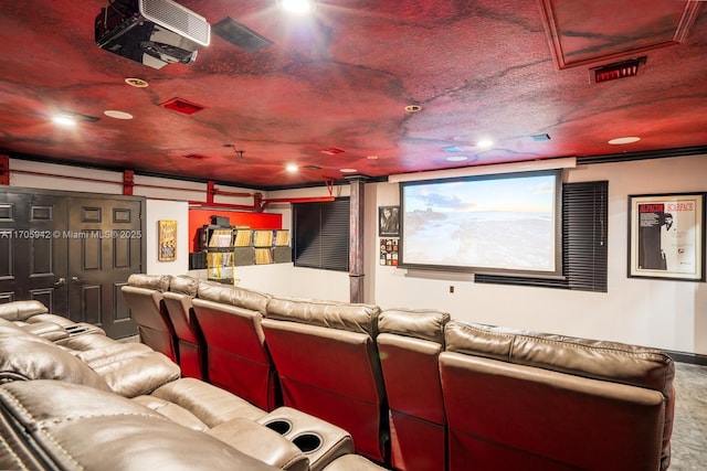 cinema room featuring a textured ceiling