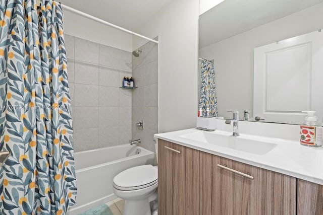 full bathroom featuring tile patterned floors, vanity, shower / bath combination with curtain, and toilet