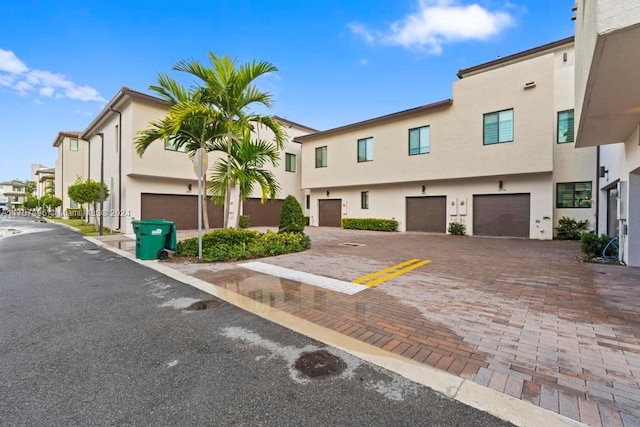 view of front of property featuring a garage