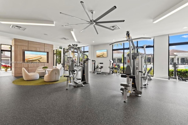 gym featuring ceiling fan