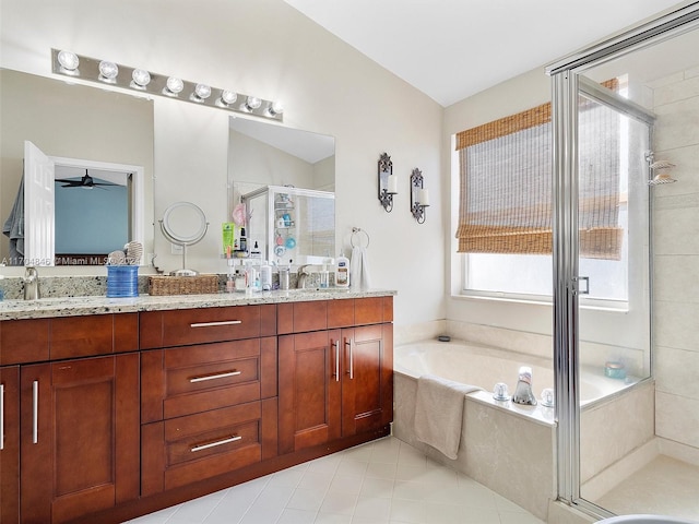 bathroom with tile patterned floors, ceiling fan, vanity, and independent shower and bath