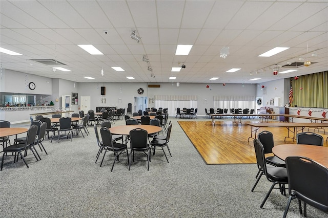 dining space featuring a paneled ceiling