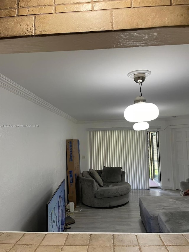 living room with ornamental molding