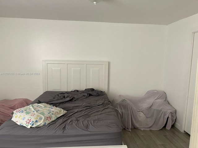 bedroom with light hardwood / wood-style floors