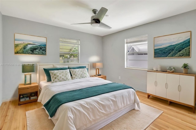 517 S 19th Ave, Hollywood, FL 33020 - bedroom with light wood-style floors and a ceiling fan