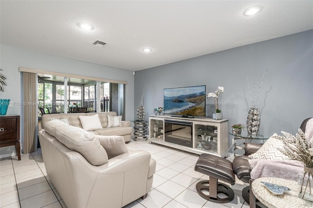 tiled living room with a textured ceiling