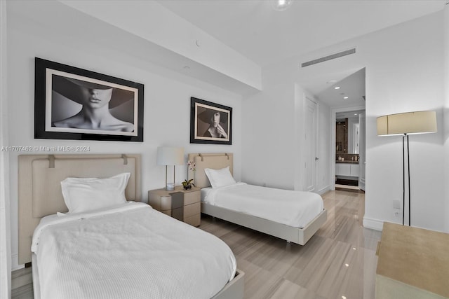 bedroom featuring hardwood / wood-style floors