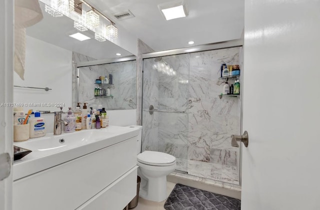 bathroom featuring vanity, toilet, tile walls, and a shower with shower door