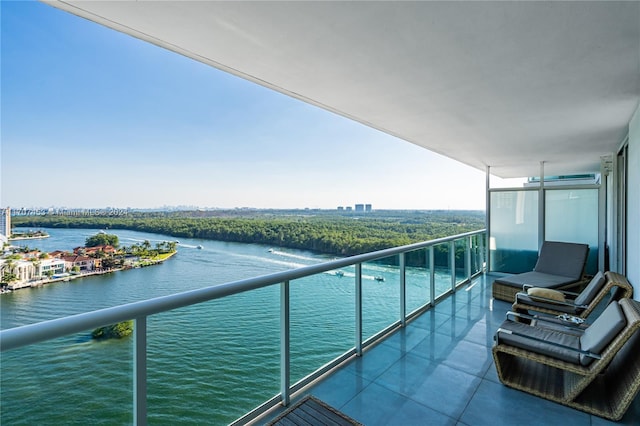 balcony featuring a water view