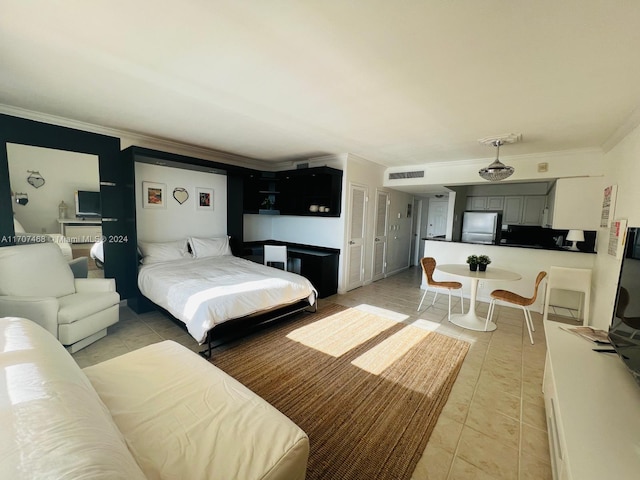 bedroom with stainless steel refrigerator, ornamental molding, and light tile patterned flooring