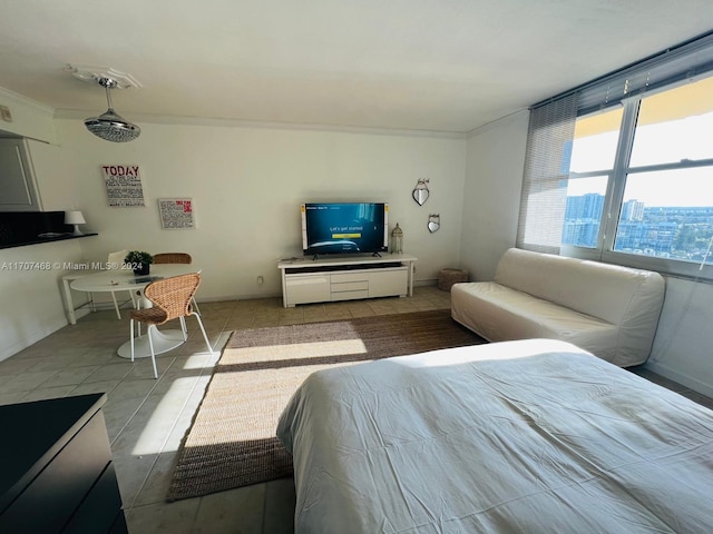 bedroom with ornamental molding