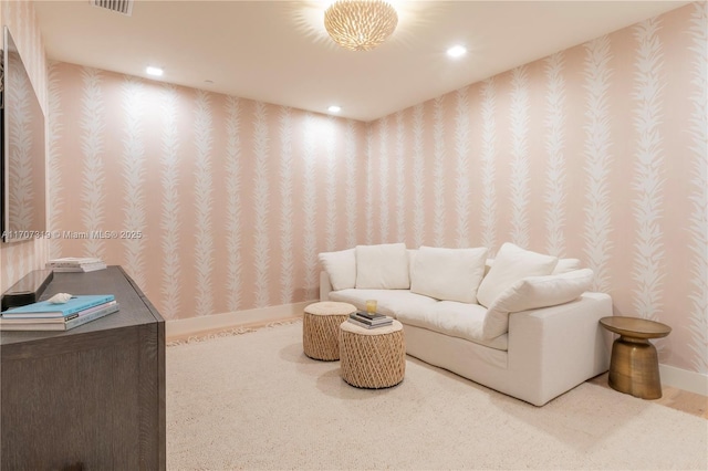 living area featuring wallpapered walls, recessed lighting, baseboards, and carpet floors