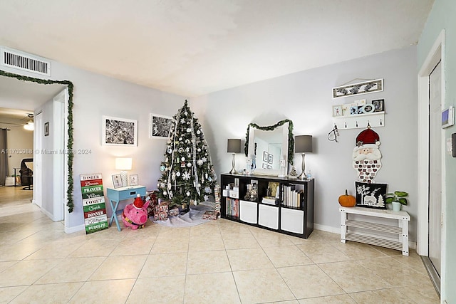 playroom with light tile patterned floors