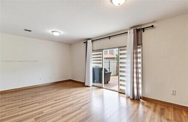 2872 SW 127th Way Unit 1, Miramar, FL 33027 - unfurnished room featuring light wood-style floors and baseboards