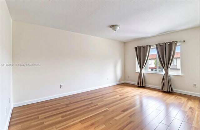 2872 SW 127th Way Unit 1, Miramar, FL 33027 - empty room with light wood-style floors and baseboards