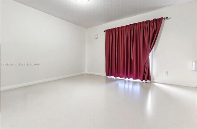 2872 SW 127th Way Unit 1, Miramar, FL 33027 - empty room with a textured ceiling