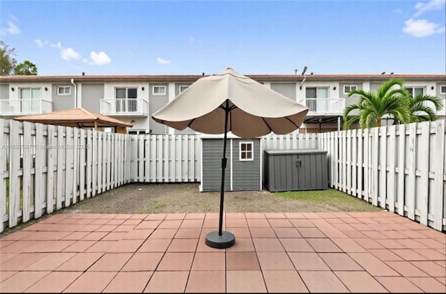2872 SW 127th Way Unit 1, Miramar, FL 33027 - fenced backyard with a patio area and a storage unit