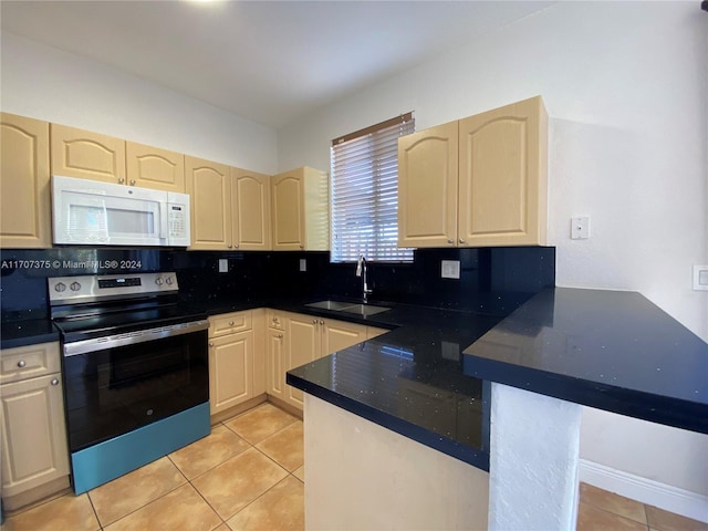 kitchen featuring stainless steel range with electric stovetop, decorative backsplash, light tile patterned floors, and sink