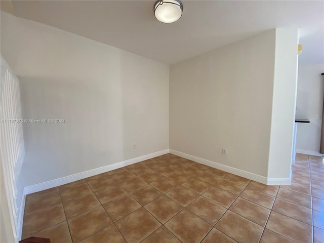 view of tiled spare room