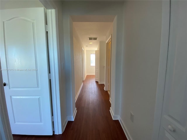 hall featuring dark hardwood / wood-style flooring