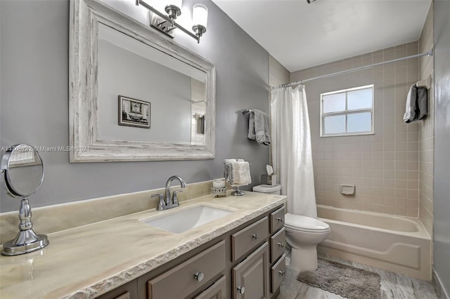 full bathroom featuring vanity, toilet, and shower / bath combo with shower curtain