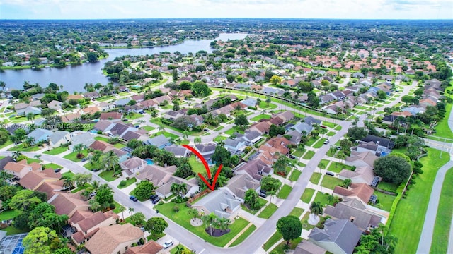 drone / aerial view featuring a water view