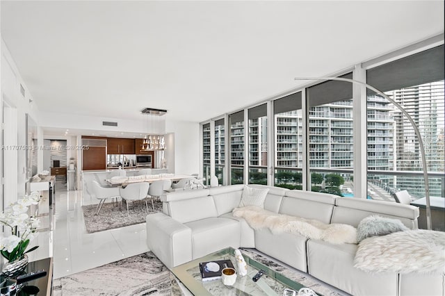 living room with a wall of windows