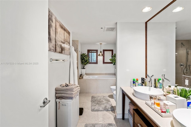 full bathroom featuring vanity, plus walk in shower, a bidet, tile patterned floors, and toilet