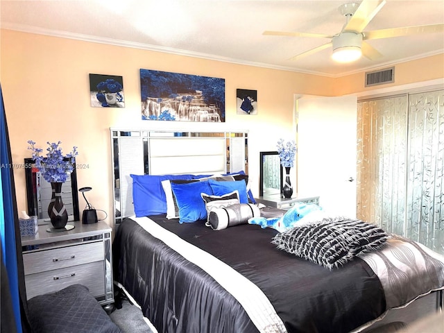 bedroom featuring ceiling fan and ornamental molding