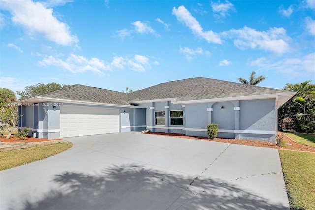 ranch-style house featuring a garage