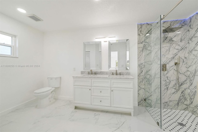 bathroom with toilet, an enclosed shower, and vanity