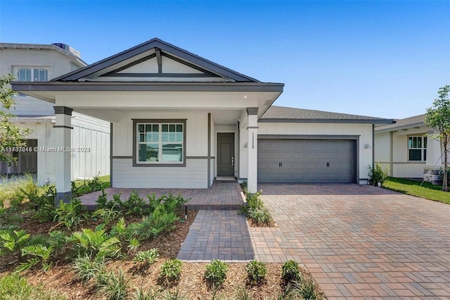 view of front of property featuring a garage