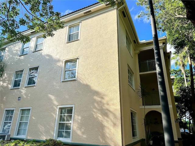 view of property exterior with stucco siding