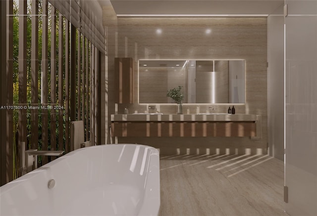 bathroom featuring wood-type flooring and a tub