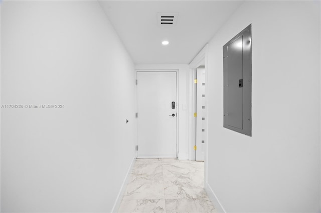 hallway featuring electric panel