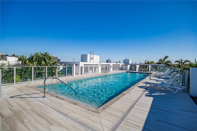 view of pool featuring a patio