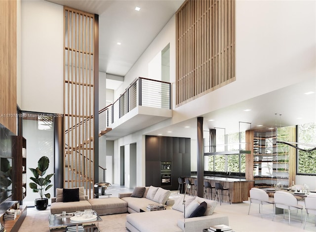 living room with a high ceiling