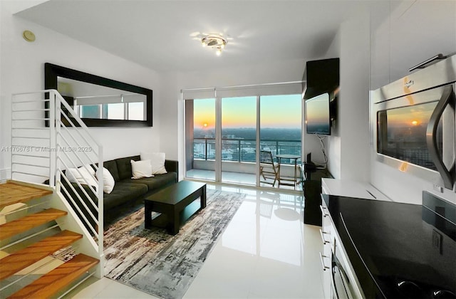 living room with light tile patterned floors