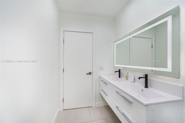 bathroom featuring tile patterned floors and vanity