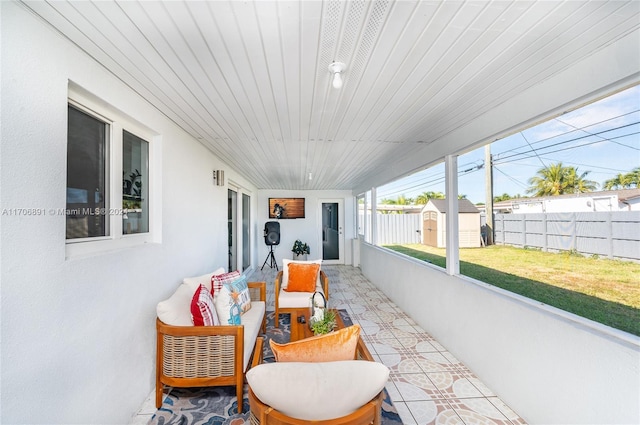 sunroom with wood ceiling