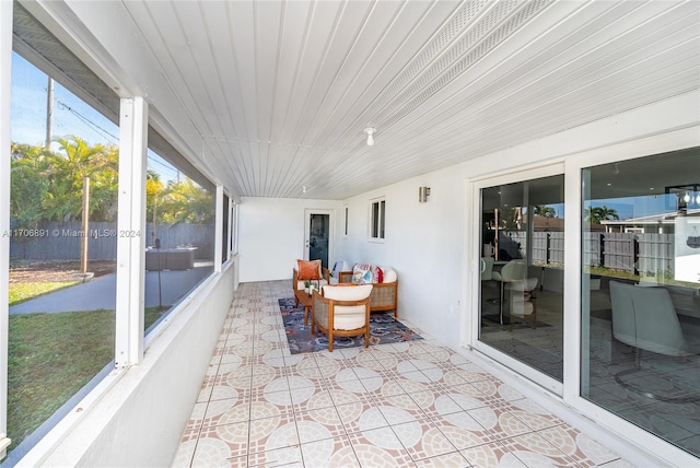 sunroom with wood ceiling