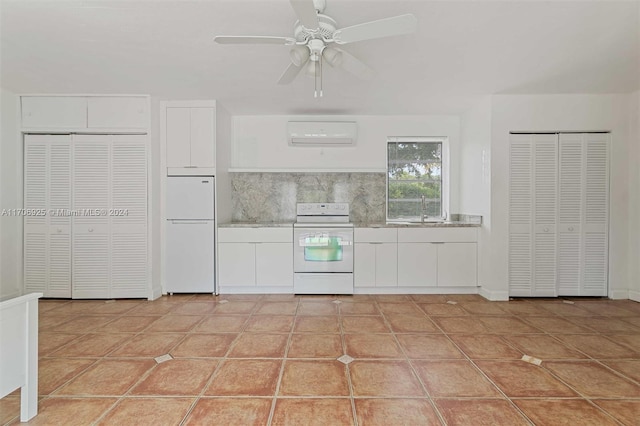 kitchen featuring white cabinetry, sink, tasteful backsplash, white refrigerator, and range