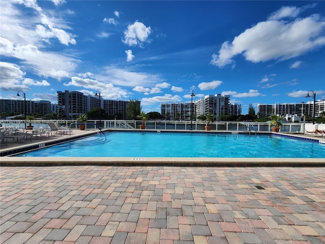 community pool with a patio