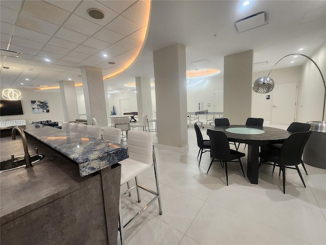 dining room with light tile patterned floors