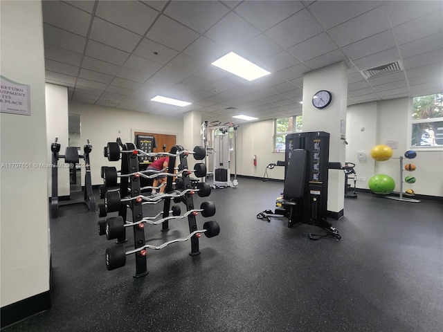 workout area with a drop ceiling