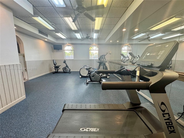 exercise room with a drop ceiling