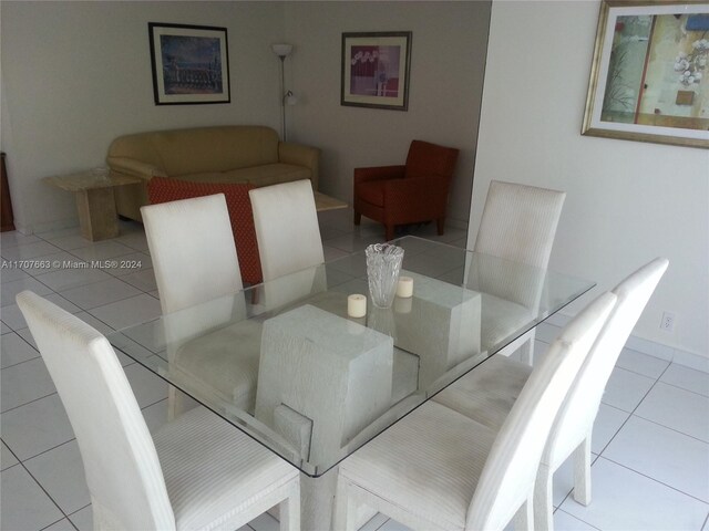 dining room with light tile patterned flooring